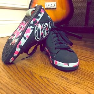 Pink and black Healeys with wheel included